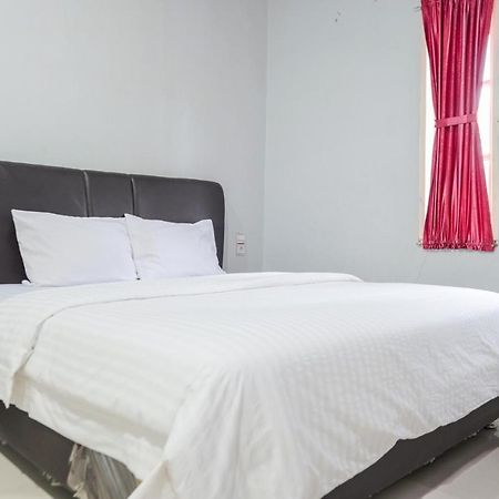 Djaboerigin Mongonsidi Guest House Redpartner Medan Luaran gambar