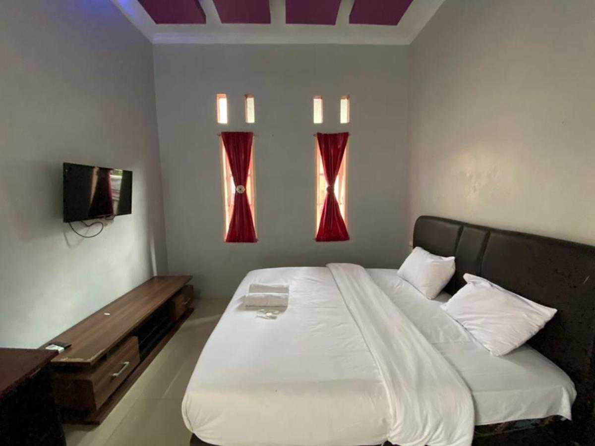 Djaboerigin Mongonsidi Guest House Redpartner Medan Luaran gambar