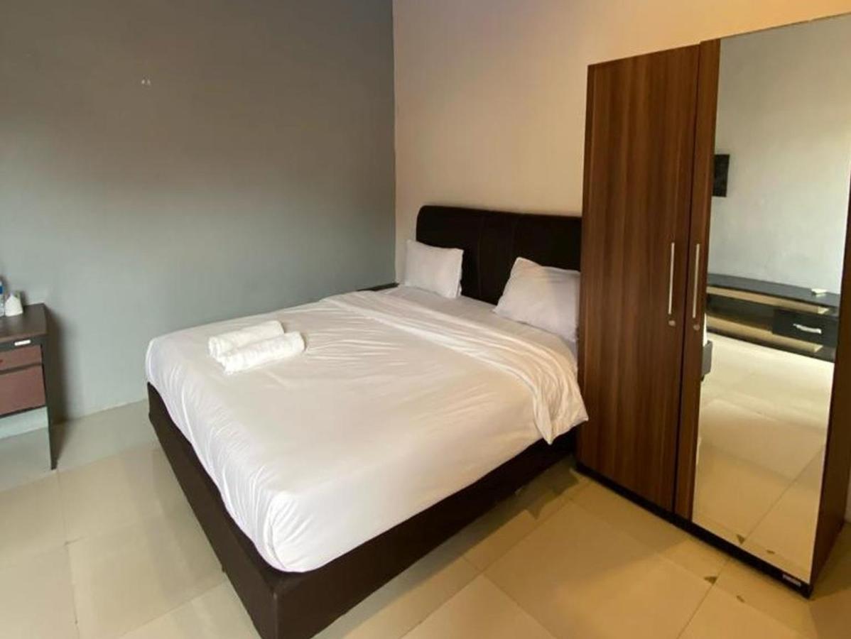Djaboerigin Mongonsidi Guest House Redpartner Medan Luaran gambar